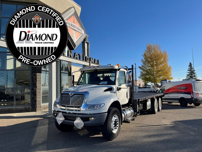 This pre-owned 2020 MV607 tandem flat deck is a Diamond Certified Full Maintenance Lease Return, fea...