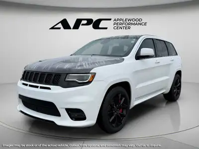 Experience the commanding presence of the 2019 Jeep Grand Cherokee SRT 4x4 in a sophisticated White...