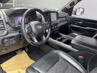 The 2019 Ram 1500 Sport 4x4 Quad Cab in a majestic black on black configuration exemplifies power, s... (image 8)