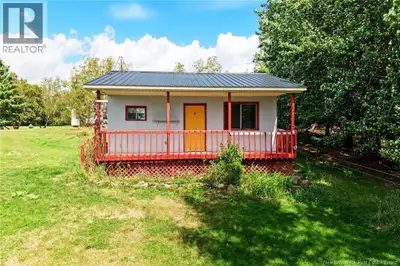 Welcome to this sweet waterfront cottage on Sand Point Road, nestled on just over an acre along the...