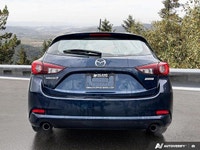 Designed for your everyday journey, this 2017 Mazda3 GX Hatchback in striking Deep Crystal Blue Mica... (image 3)