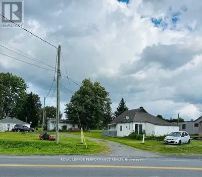 Unique opportunity of owning 3 cottages on 2.3 acres of land right across from water. You can rent o...