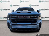 The new 2026 GMC Sierra 2500HD SLT in a bright white finish with 44 drivetrain is engineered for the... (image 2)