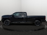This 2026 RAM 2500 TRADESMAN CREW CAB 4X4 has the following options Cloth 40/20/40 Bench Seat, 8.4 T... (image 1)