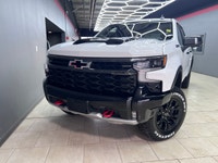 Introducing the 2024 Chevrolet Silverado 1500 ZR2 Crew Cab Short Box 4-Wheel Drive in brilliant whit... (image 1)