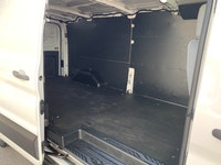 Focused on utility and economy, this Ford Transit is a strong contender in the work van market. This... (image 9)