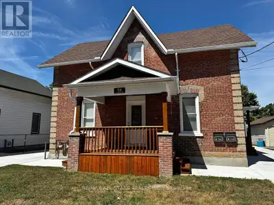 Welcome to this beautifully restored century brick home in the sought-after north end of Lindsay. Bl...
