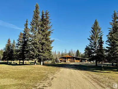 Private and secluded acreage close to crown land and the Pembina River! This home sits a quarter mil...