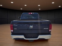 Experience the perfect blend of power and style with the 2020 Ram 1500 Classic SLT 4x4 Reg Cab, dres... (image 5)