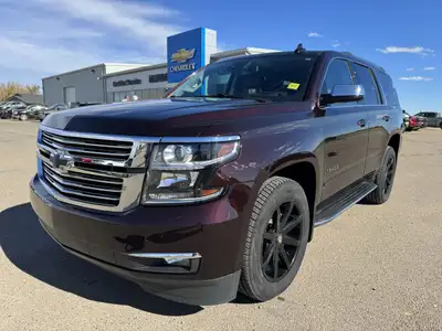 Our impressive 2020 Chevrolet Tahoe Premier 4WD in Black Cherry Metallic provides premium accommodat...