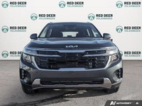 The 2025 Kia Seltos X-Line AWD in a striking gray finish with an automatic transmission offers confi... (image 2)