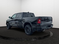 This 2026 RAM 1500 REBEL CREW CAB 4X4 has the following options Lux Leather Trimmed Bucket Seats, Re... (image 3)