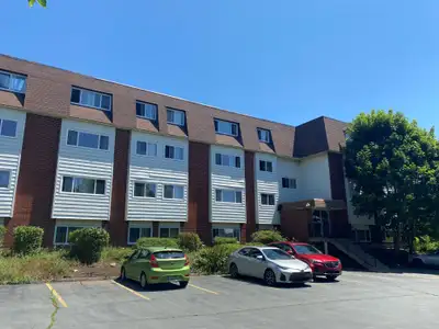 Located in Woodside, off of Pleasant Street, this attractive building is within walking distance of...