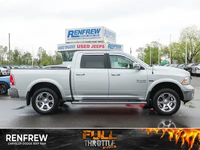 This 2018 Ram 1500 Laramie Crew Cab for sale in Calgary. Bright Silver Metallic paint, featuring fro...