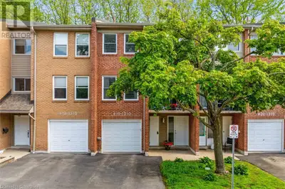 Welcome to this beautifully maintained, move-in ready 4-bedroom, 2-bathroom townhome nestled on a qu...