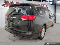 This Chrysler Grand Caravan boasts a Regular Unleaded V-6 3.6 L/220 engine powering this Automatic t... (image 4)