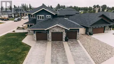 This amazing family home in Lacombe sits on a close with wonderful neighbours and includes a triple...
