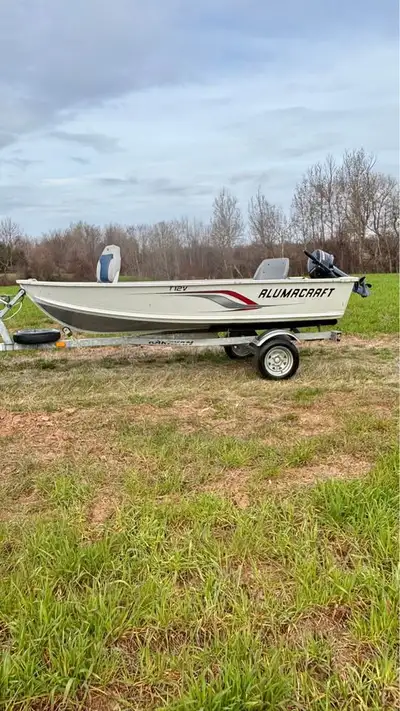 Selling my 2012 Alumacraft Wide/Deep Body 12FT Aluminum Boat WITH Galvanized Karavan Boat Trailer (T...