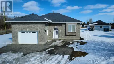 Le Château de Cache Bay - where elegance meets country comfort. This stunning all-brick 2,135 sq. ft...