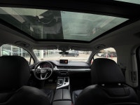 The 2019 Q7 is a mid-size luxury SUV known for its car-like handling, high-quality interior material... (image 7)
