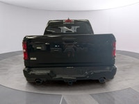 The 2026 Ram 1500 Express 4x4 Crew Cab 57 Box is a powerful yet stylish black truck thats ready for... (image 3)