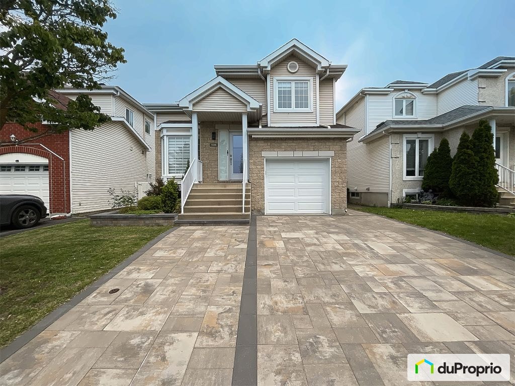 $722,000 - 2 Storey for sale in Ste-Rose — photo 1