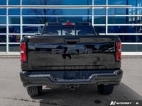 Odometer is 12404 kilometers below market average! Diamond Black Crystal Pearlcoat 2025 Ram 1500 Tra... (image 4)