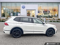 This Volkswagen Tiguan delivers a Intercooled Turbo Regular Unleaded I-4 2.0 L/121 engine powering t... (image 5)
