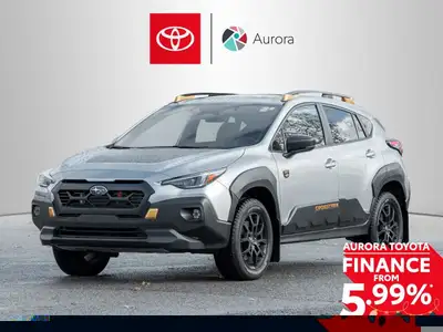 The 2024 Subaru Crosstrek Wilderness AWD in a striking silver finish with an automatic AWD transmiss...