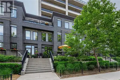 Experience sophisticated urban living in this architecturally striking townhome in Guelph’s coveted...