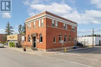 Prominent commercial building in the downtown core of Hagersville. This solid brick character buildi...