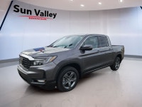 The 2023 Honda Ridgeline offers a blend of luxury and convenience with its keyless entry and remote... (image 2)