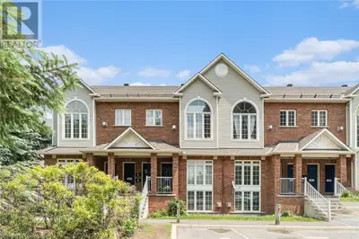 Welcome to this beautiful, carpet-free upper-level unit featuring oak hardwood flooring throughout....