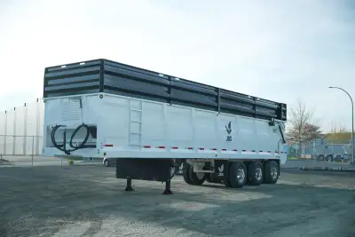 stock photo. HYD LIFT TAIL GATE. 3' WALL EXTENSIONS, 22.5 TIRES/RIMS CALL DEW-FAB, dealer for JBS. 7...
