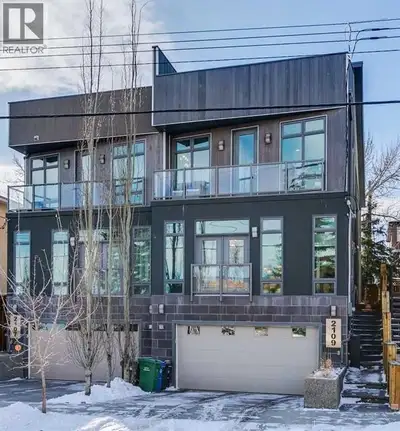 Front attached garage in the inner City!! Rare find. This high end custom executive home features; K...