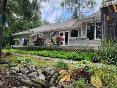 R19//Little Deer/This exquisite lakefront three bedroom home is truly a masterpiece. No expenses wer...