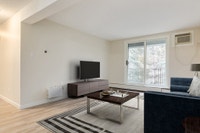Amenities: Air Conditioning • Outdoor Courtyard • Storage Room Suite & Building: Spacious one-bedroo... (image 3)