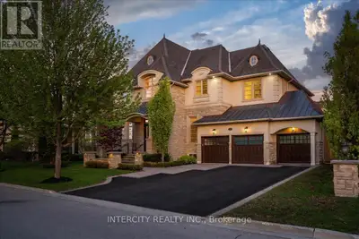 Nestled within a quiet, estate-style neighbourhood known for its larger lots, luxury homes, and excl...