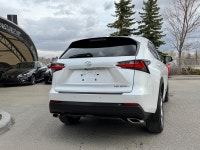 The NX 200t is characterized by its aggressive "spindle" grille and sharp, angular body lines. As th... (image 2)