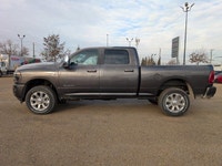 The 2026 Ram 3500 Laramie Crew Cab in Granite Crystal Metallic combines heavy-duty capability with p... (image 2)