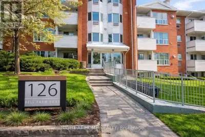 Bright and accessible garden-level condo in ideal location! Very accessible 2-bedroom, 2-bath, end-u...