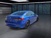 The 2024 Honda Civic Sedan Sport in stylish Blue is a front-wheel-drive masterpiece that promises im... (image 7)