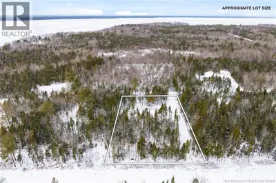 Welcome to this incredible opportunity to own a private, treed lot just steps from the water. Spanni...