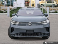 Embrace the future of driving with the sophisticated 2025 Volkswagen ID.4 Pro S Sport Utility, finis... (image 1)