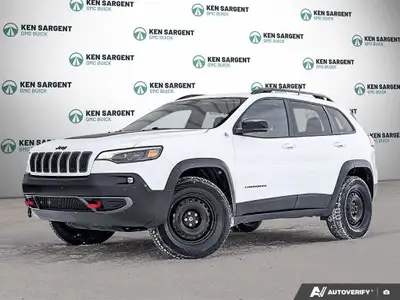 The 2022 Jeep Cherokee Trailhawk 4x4 in striking White is built to tackle any terrain with ease, tha...
