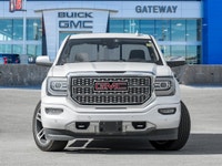Turn heads and experience refined luxury with the 2018 GMC Sierra 1500 Denali, blending bold design,... (image 1)