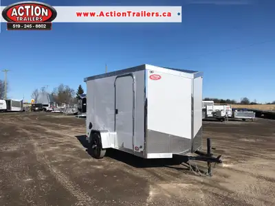 IRON LITE SERIES 6' X 10' SINGLE AXLE CARGO TRAILER WITH REAR RAMP DOOR AND POLYCORE UPGRADES! Unloc...