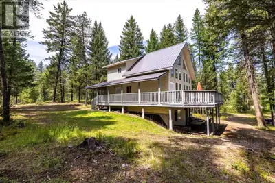Peaceful, private, and packed with charm, this family cottage on 1.78 acres is just steps from the s...