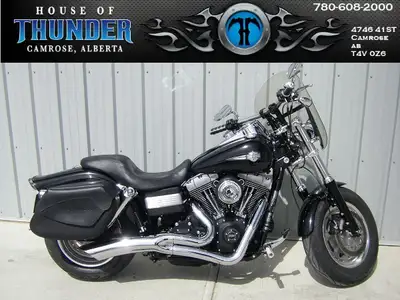 Built to stand out and ride hard, this 2013 Fat Bob brings raw Harley-Davidson power with an aggress...