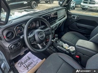 Embrace boundless adventure in this rugged 2025 Jeep Wrangler Rubicon Convertible. Presented in a st... (image 9)